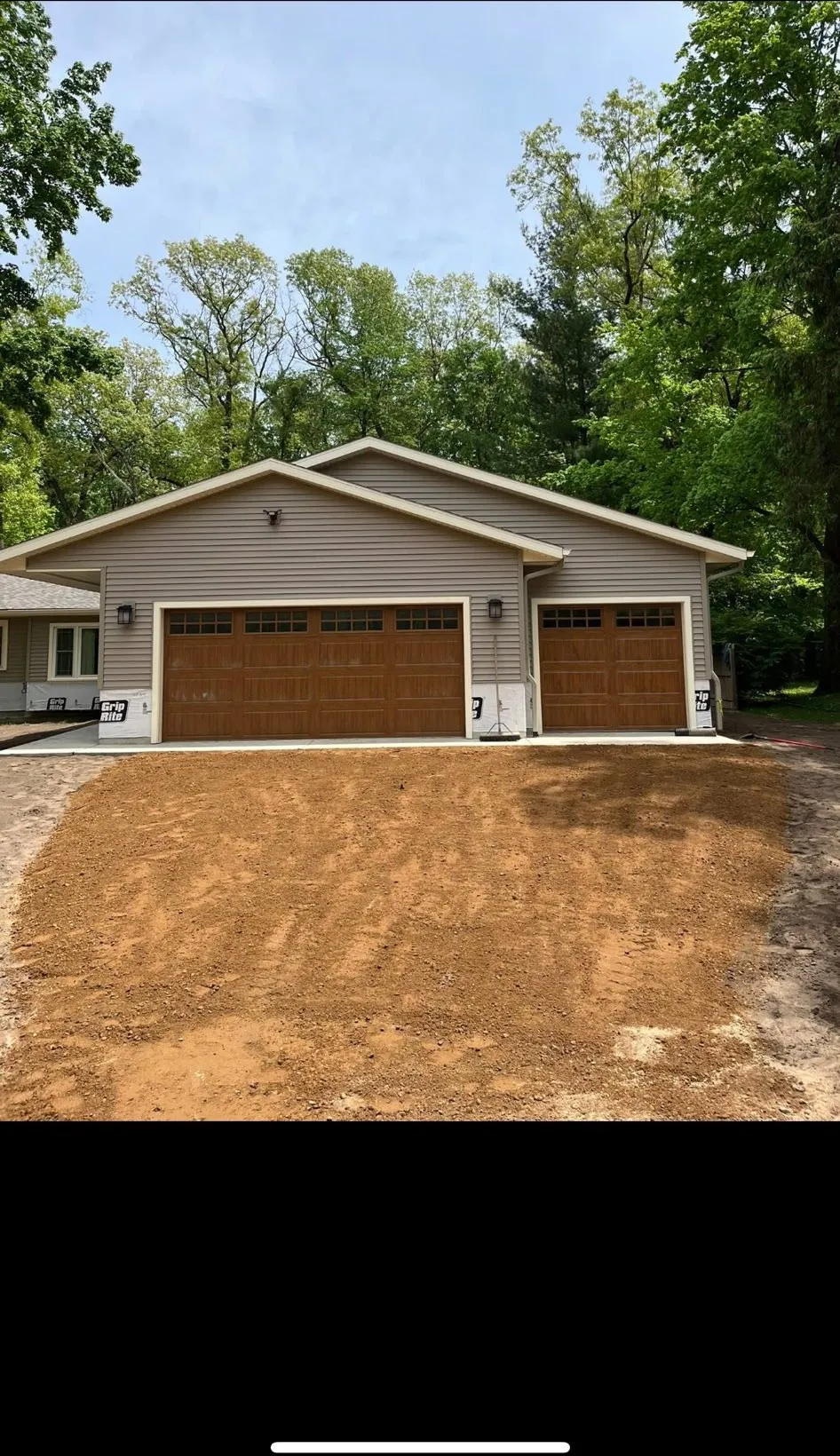 Graded and compacted driveway base ready for new concrete